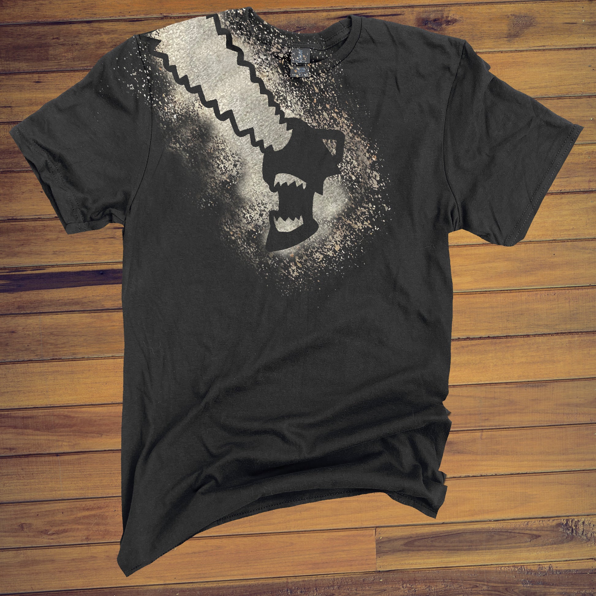 Black T Shirt with Chainsaw Man design across the front and shoulder made with bleach