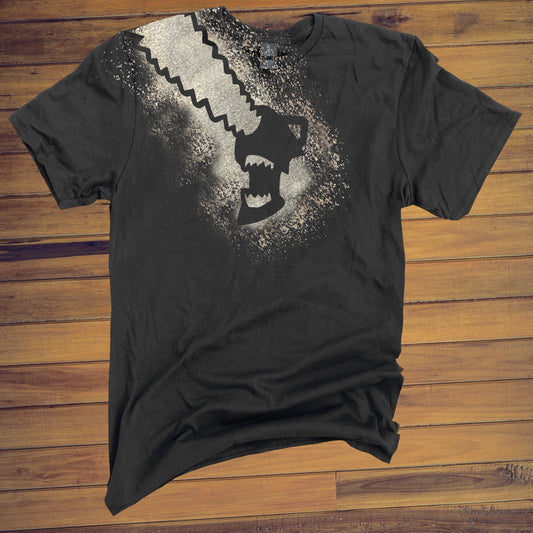 Black T Shirt with Chainsaw Man design across the front and shoulder made with bleach