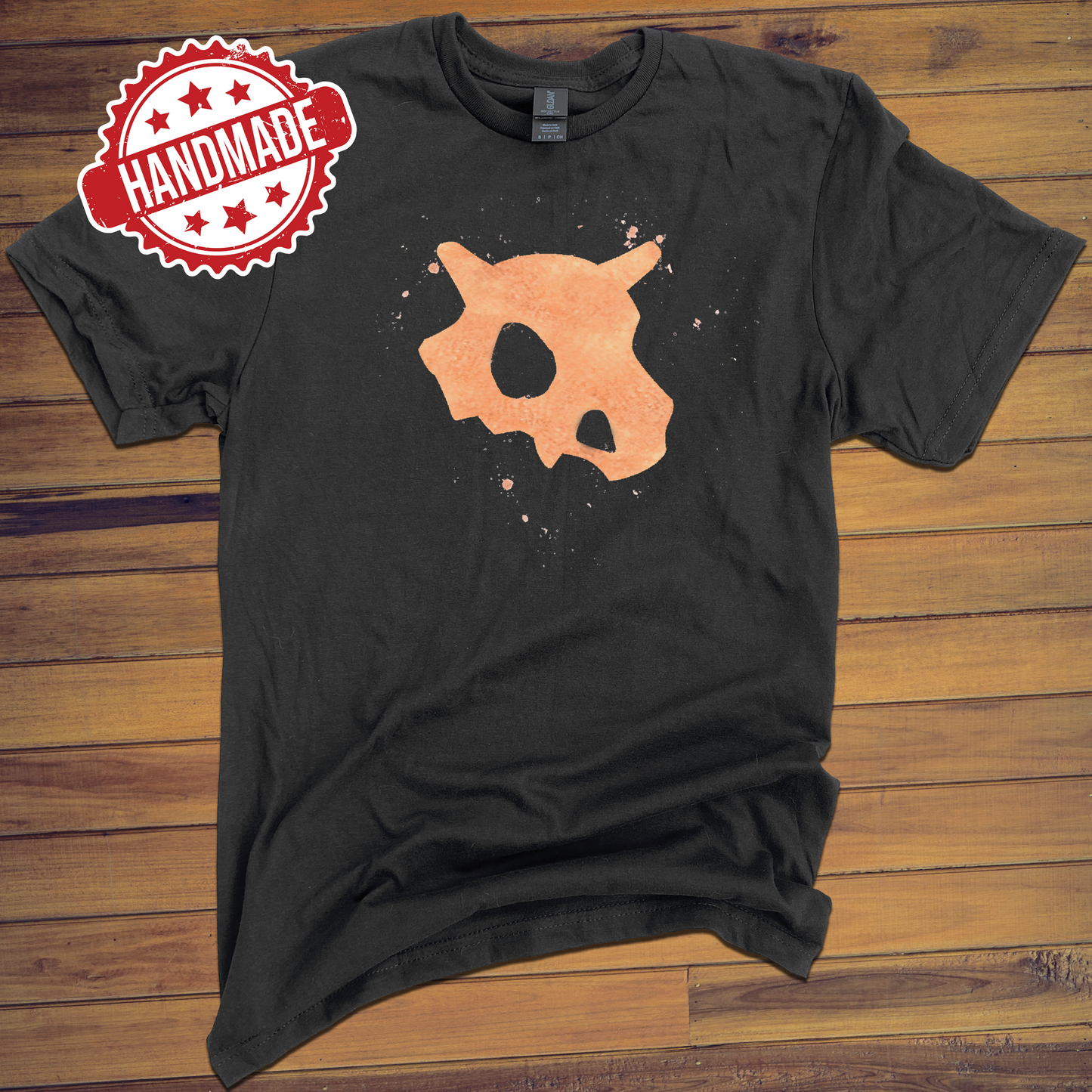 Black shirt with the Pokemon Cubone on it, made with bleach