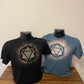 one black and one blue tee shirt with a D20 design, made with bleach. They are sitting on shirt forms, side by side