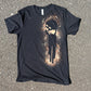 a black tee shirt with a Minecraft Enderman logo made with bleach