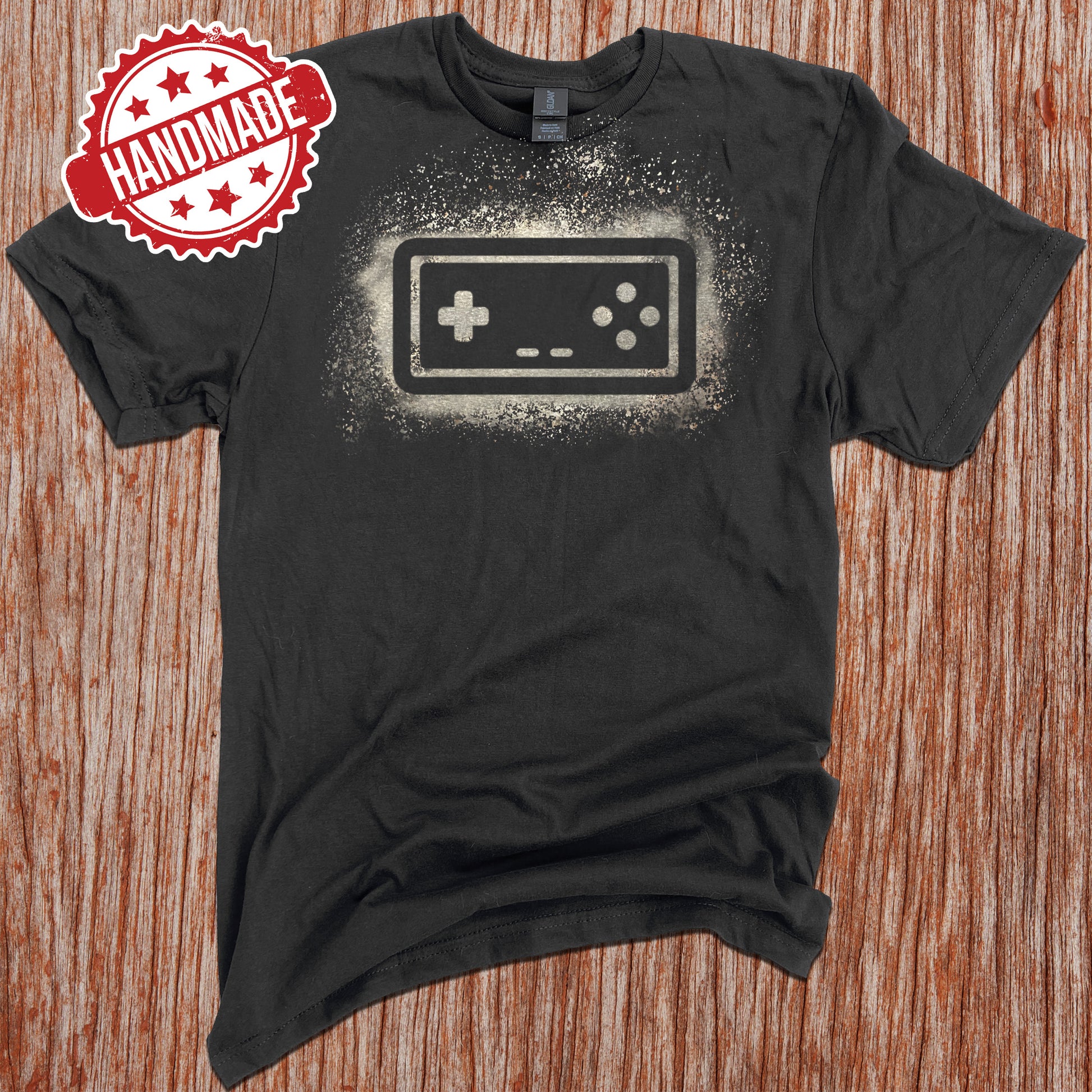 black, retro Nintendo game shirt with an snes controller design made with bleach