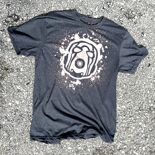 A charcoal gray shirt with a Psycho design from Borderlands made with bleach