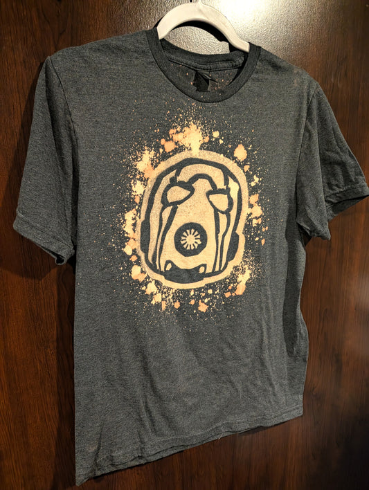 Charcoal shirt with a boderlands psycho design made out of bleach