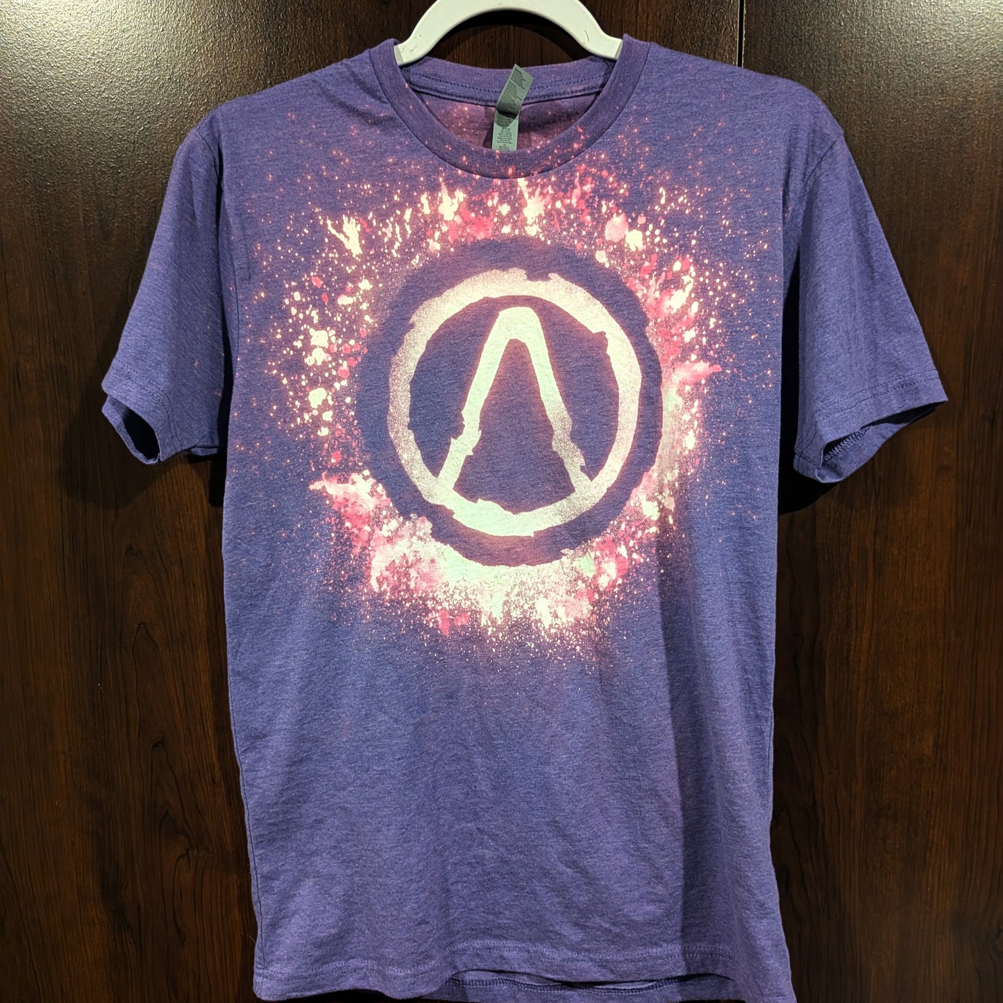 Purple Borderlands tee shirt with a Vault Symbol made with bleach