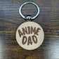 Round wooden "Anime Dad" keychain, laser-engraved