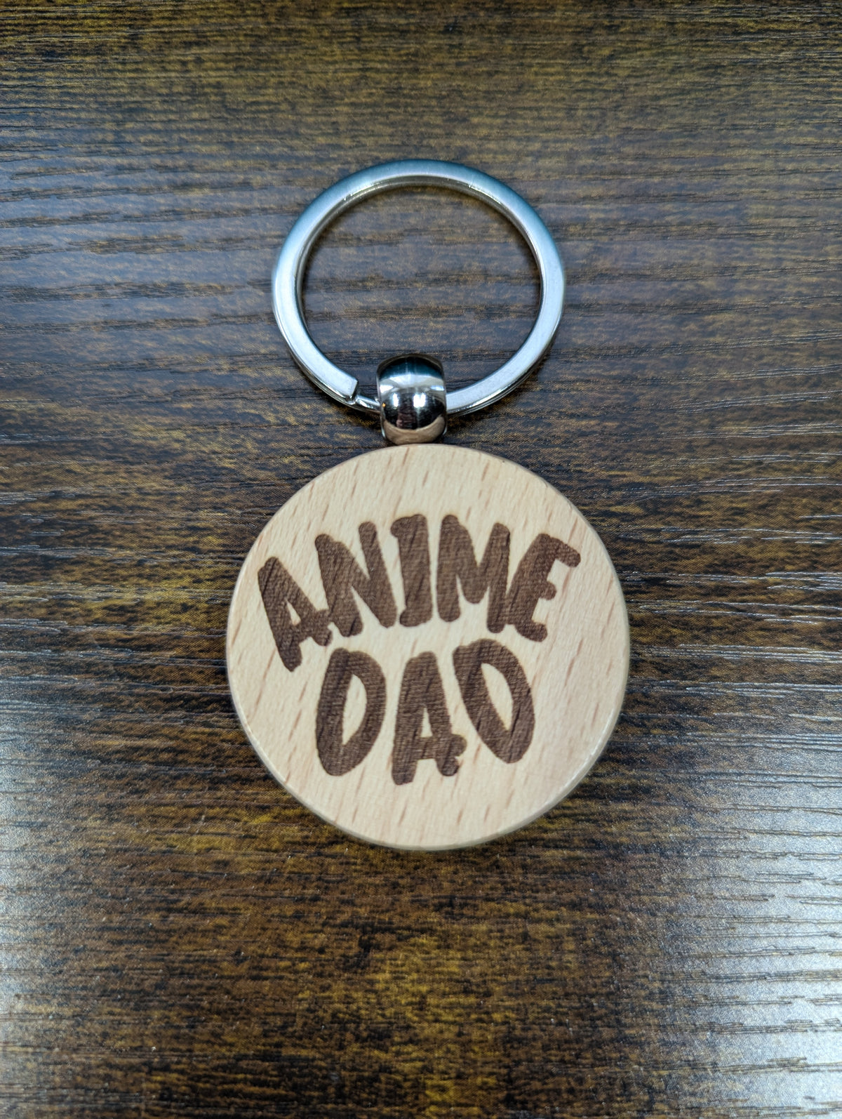 Round wooden "Anime Dad" keychain, laser-engraved
