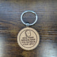 Round wooden anime keychain laser-engraved with "How many breads have you eaten in your life?" JoJo quote